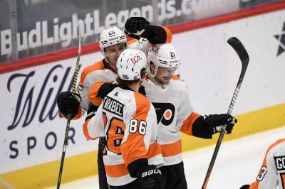 Alex Ovechkin - James Van-Riemsdyk - Carter Hart - Joel Farabee - Alain Vigneault - Laughton's 1st hat trick lifts Flyers past Capitals, 7-4 - clickorlando.com - Washington - city Boston - city Washington - city Philadelphia - county Scott