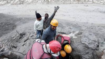 Rescuers in India digging for 37 trapped in glacier flood - clickorlando.com - India