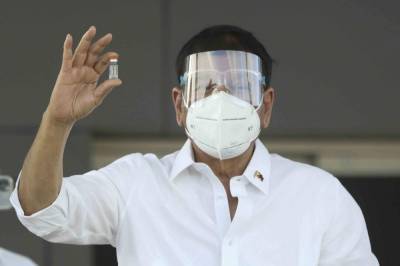 Rodrigo Duterte - Philippines launches virus vaccinations amid supply problems - clickorlando.com - China - Philippines - city Manila
