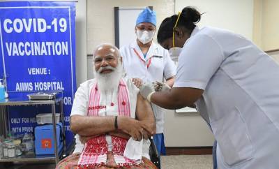 Narendra Modi - India giving COVID-19 vaccines to more people as cases rise - clickorlando.com - city New Delhi - India
