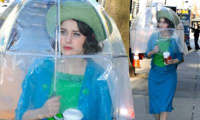 Rachel Brosnahan - Rachel Brosnahan takes COVID safety measures in HEPA FILTER umbrella to film Mrs. Maisel in New York - dailymail.co.uk - New York