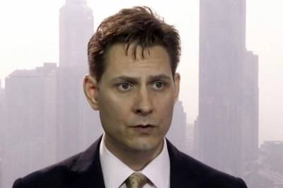 Michael Kovrig - Michael Spavor - Newspaper: China to soon try 2 Canadians on spying charges - clickorlando.com - China - city Beijing - Canada