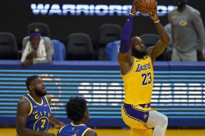 LeBron, short-handed Lakers beat up on Warriors 128-97 - clickorlando.com - Los Angeles - San Francisco
