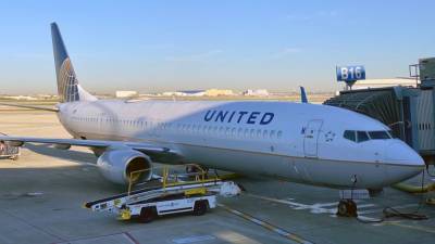 United Airlines flight diverted after man allegedly bites passenger’s ear, police say - fox29.com - city Chicago, state Illinois - state Illinois - state New Jersey - county Miami - state South Carolina - city Newark - Charleston, state South Carolina - city Charleston, state South Carolina