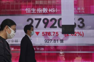 Asia stocks follow Wall Street down on renewed virus worries - clickorlando.com - city Beijing - Germany - city Tokyo - Netherlands - city Shanghai - city Hong Kong