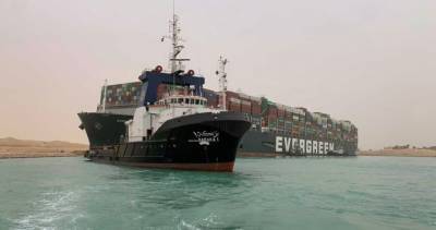 Suez Canal - Work to clear massive cargo ship blocking Suez Canal slowed by low tide - globalnews.ca - Egypt