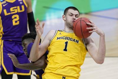 What To Watch: Michigan seeks to keep Big Ten alive in NCAAs - clickorlando.com - state Florida - state Texas - city Louisville - state Oregon - state Indiana - state Michigan - city Indianapolis - city Dickinson