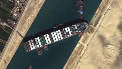 Tugboats deployed to help cargo ship stuck in Suez Canal - fox29.com - Panama - Egypt