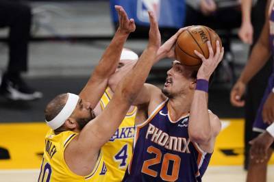 Devin Booker - Suns overcome Booker's ejection, hold off Lakers 114-104 - clickorlando.com - Los Angeles - city Los Angeles