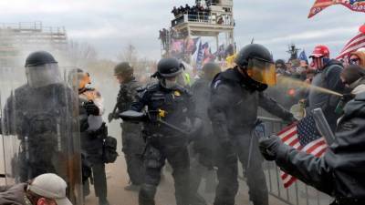 Rioters maced, trampled Capitol officers: New documents show depth of Jan. 6 attack - fox29.com