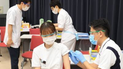 Japan's vaccine roll-out hit by supply issues - rte.ie - South Korea - Japan