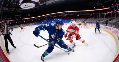 Adam Gaudette - Jake Virtanen - Canucks vs. Flames game postponed after 2 Vancouver players, coach enter COVID-19 protocol - globalnews.ca - Canada