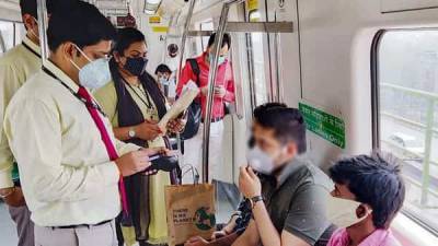 Delhi Metro fines 515 passengers in a day due to violations of Covid-19 norms - livemint.com - India - city Delhi