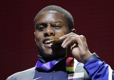 100-meter champ Coleman to miss Olympics despite reduced ban - clickorlando.com - Usa - city Tokyo - county Christian