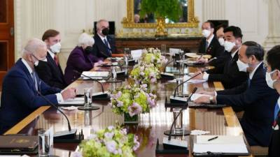 Joe Biden - Yoshihide Suga - Japan's prime minister meets with Biden, urges strong alliance to counter China - fox29.com - China - Japan - Usa - Washington - city Washington