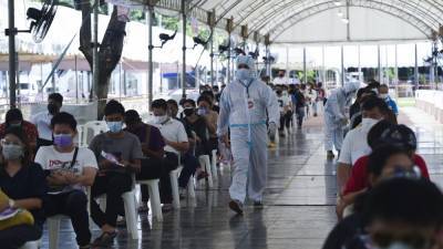 Bangkok virus spike sparks alcohol ban, venue closures - rte.ie - Thailand - India - Britain - city Bangkok - Brazil