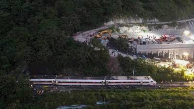 Truck knocks train off tracks in Taiwan, killing at least 48 - fox29.com - Taiwan