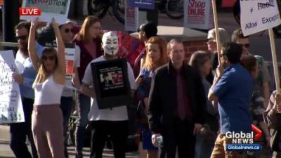 Matthew Conrod - Anti-mask rally held at Calgary Midtown Co-op - globalnews.ca
