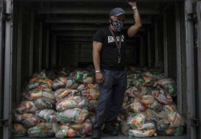 Venezuela's Maduro begins allowing aid against hunger, virus - clickorlando.com - Usa - Venezuela - city Caracas
