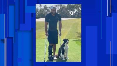 Tiger Woods - Tiger Woods, in cast and crutches, posts photo with dog in Florida - clickorlando.com - state California - state Florida - state Indiana - county Woods