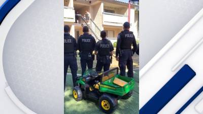 Tempe police officers surprise boy with new toy gator tractor after his old one was stolen - fox29.com