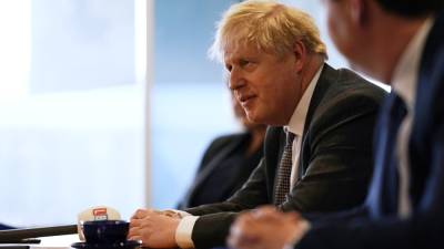 Boris Johnson - UK denies that Johnson said 'let the bodies pile high' - rte.ie - Britain