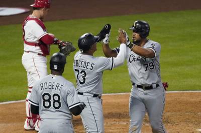 Albert Pujols - Mercedes gets 1st 5 career hits, White Sox beat Angels 12-8 - clickorlando.com - Los Angeles - Washington - county White - city Louisville - city Chicago, county White