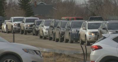 Easter Sunday - COVID-19 vaccine drive-thru line in Regina temporarily closed after 6+ hour wait time - globalnews.ca