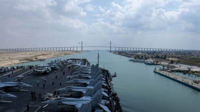 Dwight D.Eisenhower - Red Sea - US Navy aircraft carrier passes through Suez Canal after crews free stranded cargo ship - fox29.com - Usa - Egypt