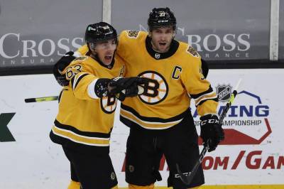 David Pastrnak - Brad Marchand - Patrice Bergeron - Bruce Cassidy - Marchand carries Bruins' big 2nd and past Penguins, 7-5 - clickorlando.com - city Boston - county Crosby - city Sidney, county Crosby