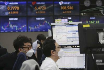 Asian shares slip on pandemic worries despite Wall St rally - clickorlando.com - Taiwan - South Korea - Japan - Hong Kong - Australia - city Tokyo - city Shanghai