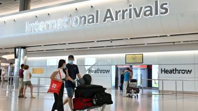 Boris Johnson - UK to announce new international travel rules - rte.ie - Britain