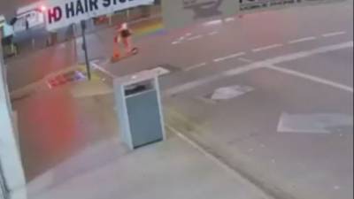 Video shows woman crash electric scooter, fly over handlebars in Australia - fox29.com - Australia