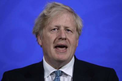 Boris Johnson - UK races to test, vaccinate as virus variant threatens plans - clickorlando.com - India - Britain - city England