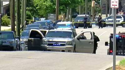 Four Alabama officers hurt after argument over dog ends in deadly shooting - fox29.com - state Alabama - city Birmingham