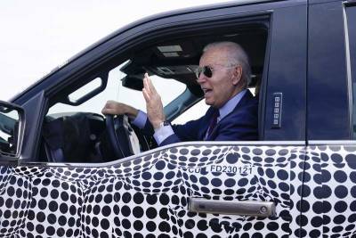 Joe Biden - Biden back behind the wheel, zooming away in electric truck - clickorlando.com - state Michigan - county Dearborn