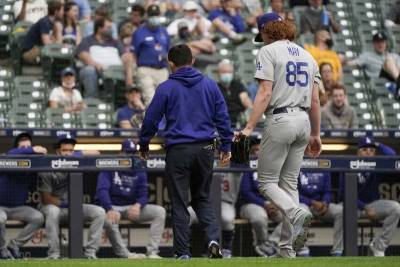 Dave Roberts - Dustin May - Dodgers' May put on injured list, latest setback for staff - clickorlando.com - Los Angeles - city Chicago - city Milwaukee - Milwaukee