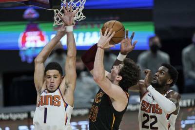 Chris Paul - Devin Booker - Booker scores 31, Suns dominate OT to beat Cavs 134-118 - clickorlando.com - county Cleveland - state Utah - county Cavalier