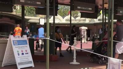 Disney World to phase out temperature screenings at theme parks - clickorlando.com