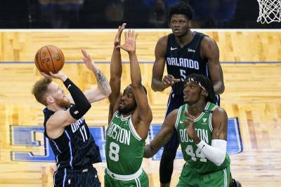 Evan Fournier - Jayson Tatum - Walker scores 32 in return from injury, Celtics rout Magic - clickorlando.com - city Boston - city Orlando