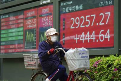 Asian stocks mostly higher on hopes for pandemic recovery - clickorlando.com - South Korea - Japan - Hong Kong - Australia - city Tokyo - city Shanghai