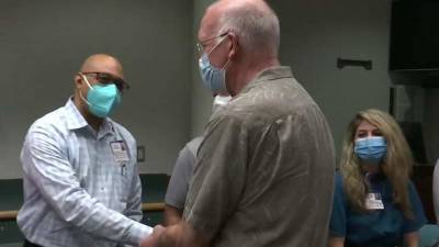 1st COVID-19 patient at Cape Canaveral Hospital returns to thank staff - clickorlando.com