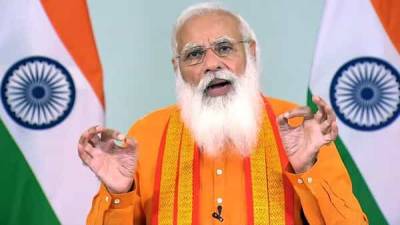 Free Covid vaccines for all Indian adults as PM Modi hails yoga 'shield' - livemint.com - city New Delhi - India