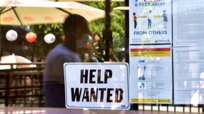 US unemployment claims drop to 385,000, another pandemic low - fox29.com - Washington