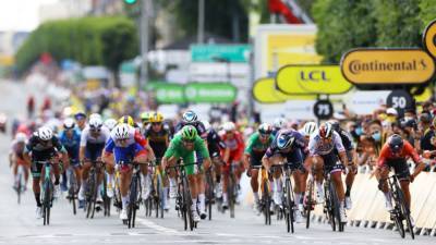 Tour de France: Organizers drop legal action against woman who caused crash - fox29.com - Germany - France