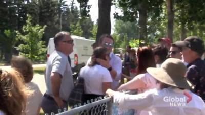 Alberta Health - Tyler Shandro - Video shows confrontation between Alberta health minister family and protestors - globalnews.ca - Canada