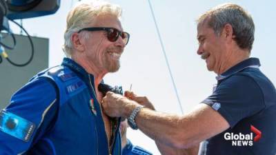 Richard Branson - Jeff Bezos - Virgin Galactic’s Richard Branson beats out rival billionaire Jeff Bezos, reaches the stars - globalnews.ca