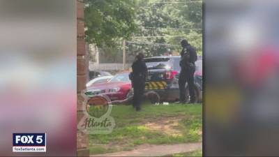 Sergeant, officer 'relieved from duty' after video surfaces showing woman being kicked - fox29.com - city Atlanta