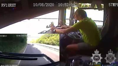 Video: UK truck driver texting before crashing into van - fox29.com - Britain