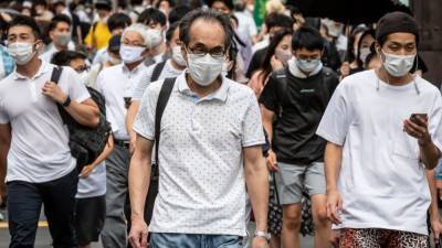 Yoshihide Suga - Japan expands virus state of emergency amid record cases, Tokyo Olympics - fox29.com - Japan - city Tokyo